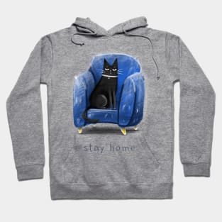 Cartoon black cat in a blue armchair and the inscription "Stay home". Hoodie